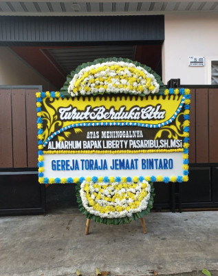 Papan Bunga Duka di Rampoang